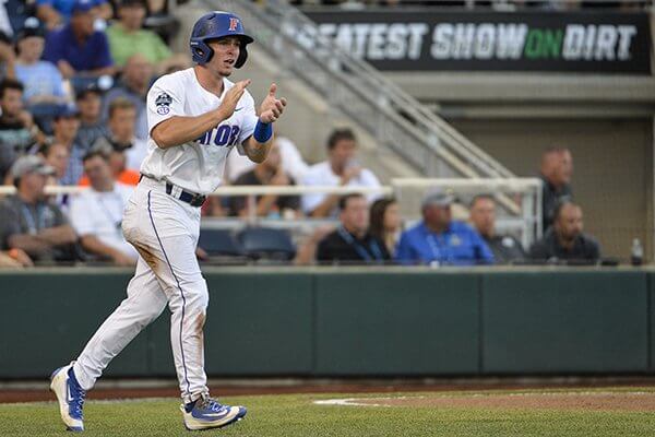 Gators use long ball to cruise past Louisville, into CWS Semifinals