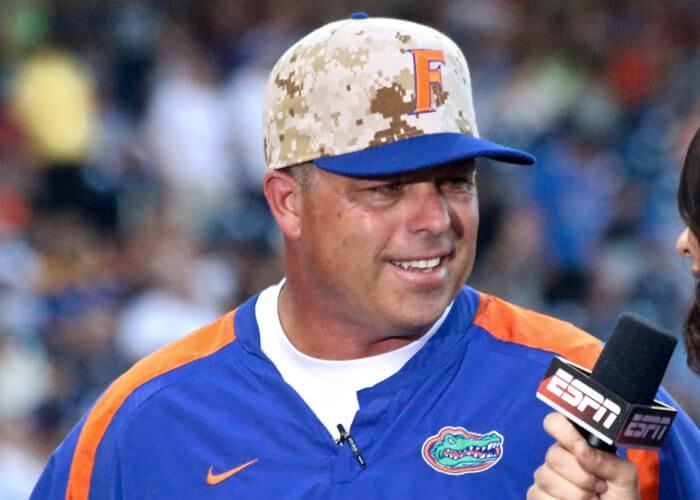 Florida Gators starting pitcher Brady Singer (51) yells in the