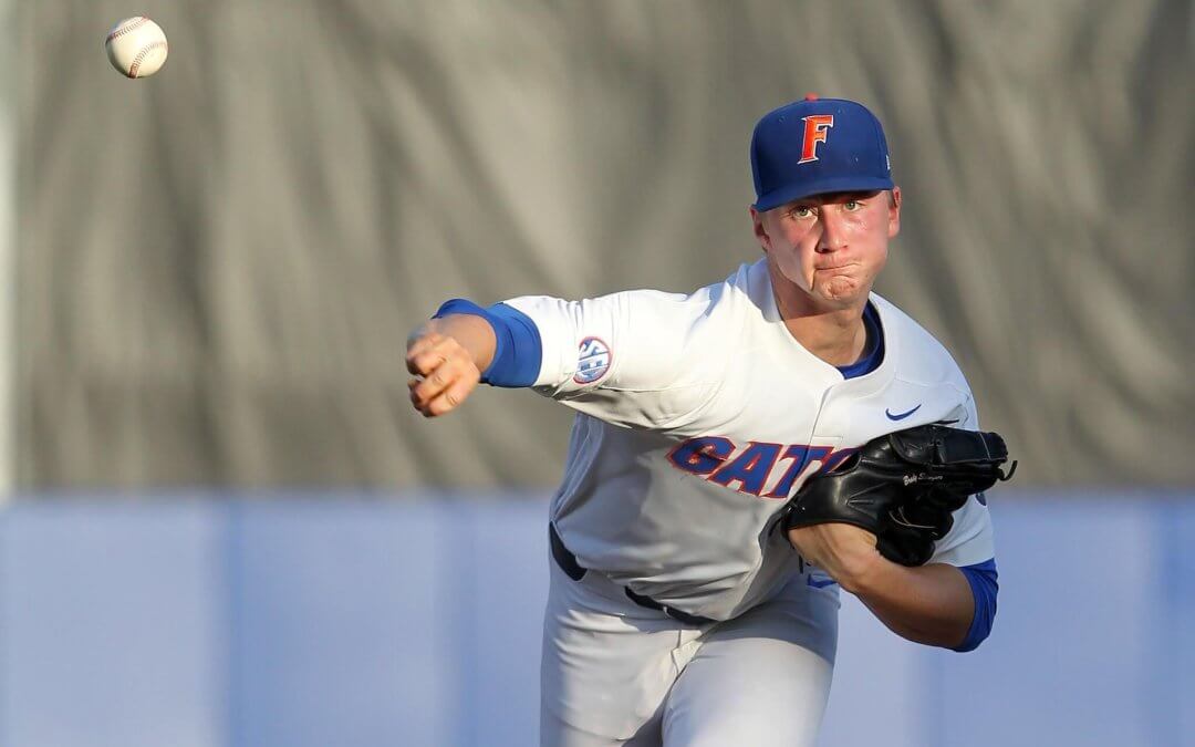 Singer shines as Gators beat up No. 1 pick Mize, Auburn, and move within one win of Omaha